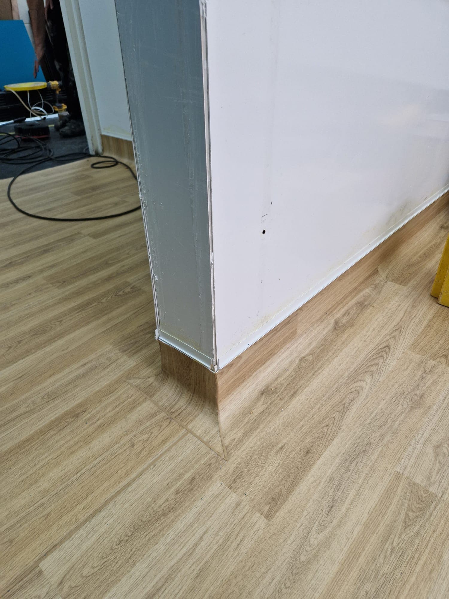 Detailed door lining cut on LVT, Derby installation