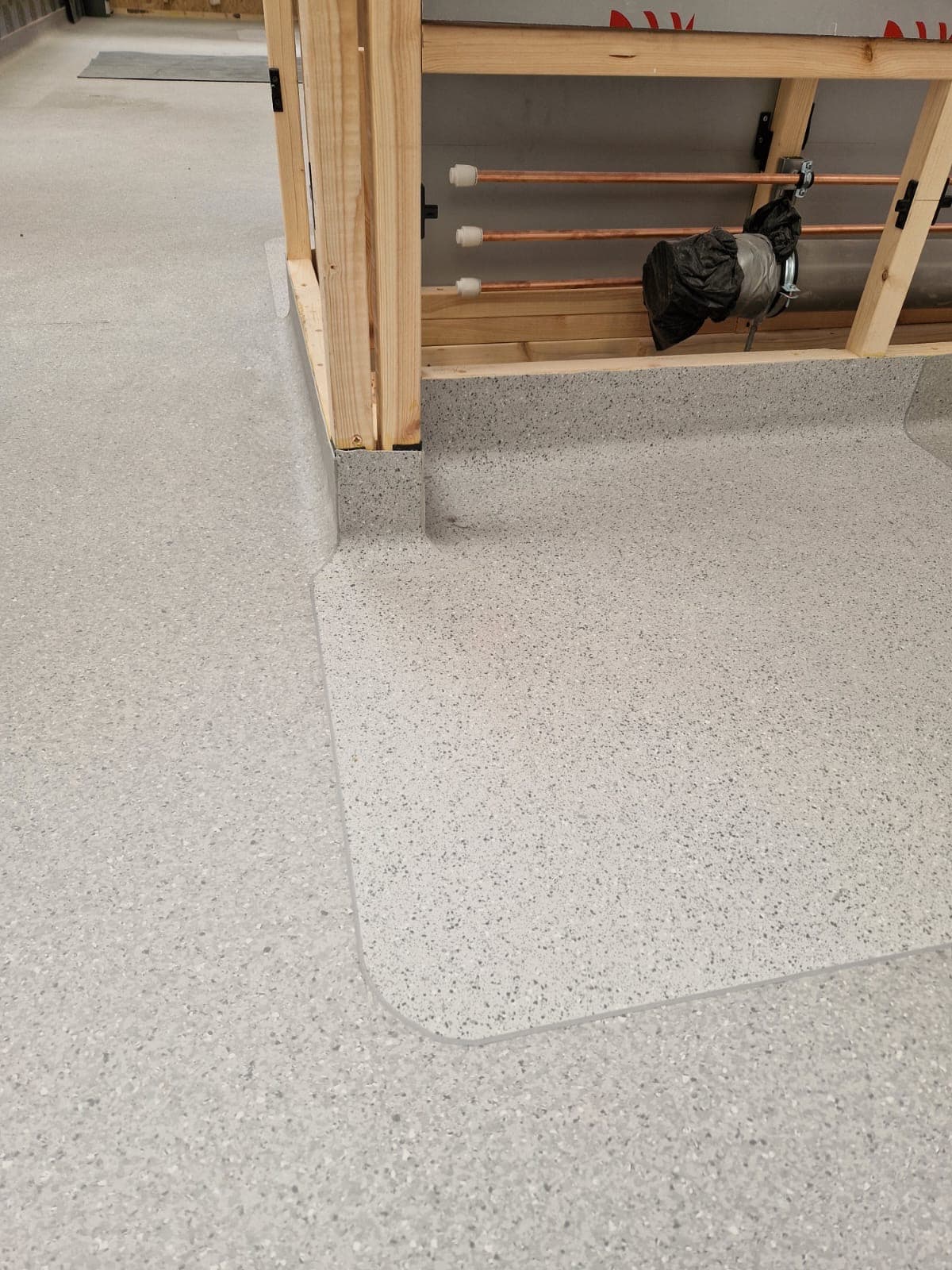 Fully welded wet room flooring with coved upstand, Nottingham healthcare install