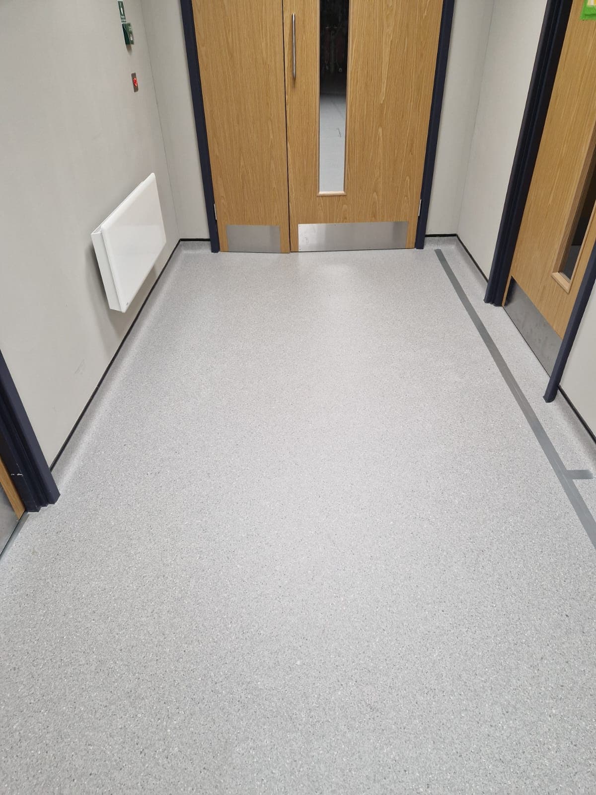 Chrome-nosed engineered timber staircase fitted in a Northampton home