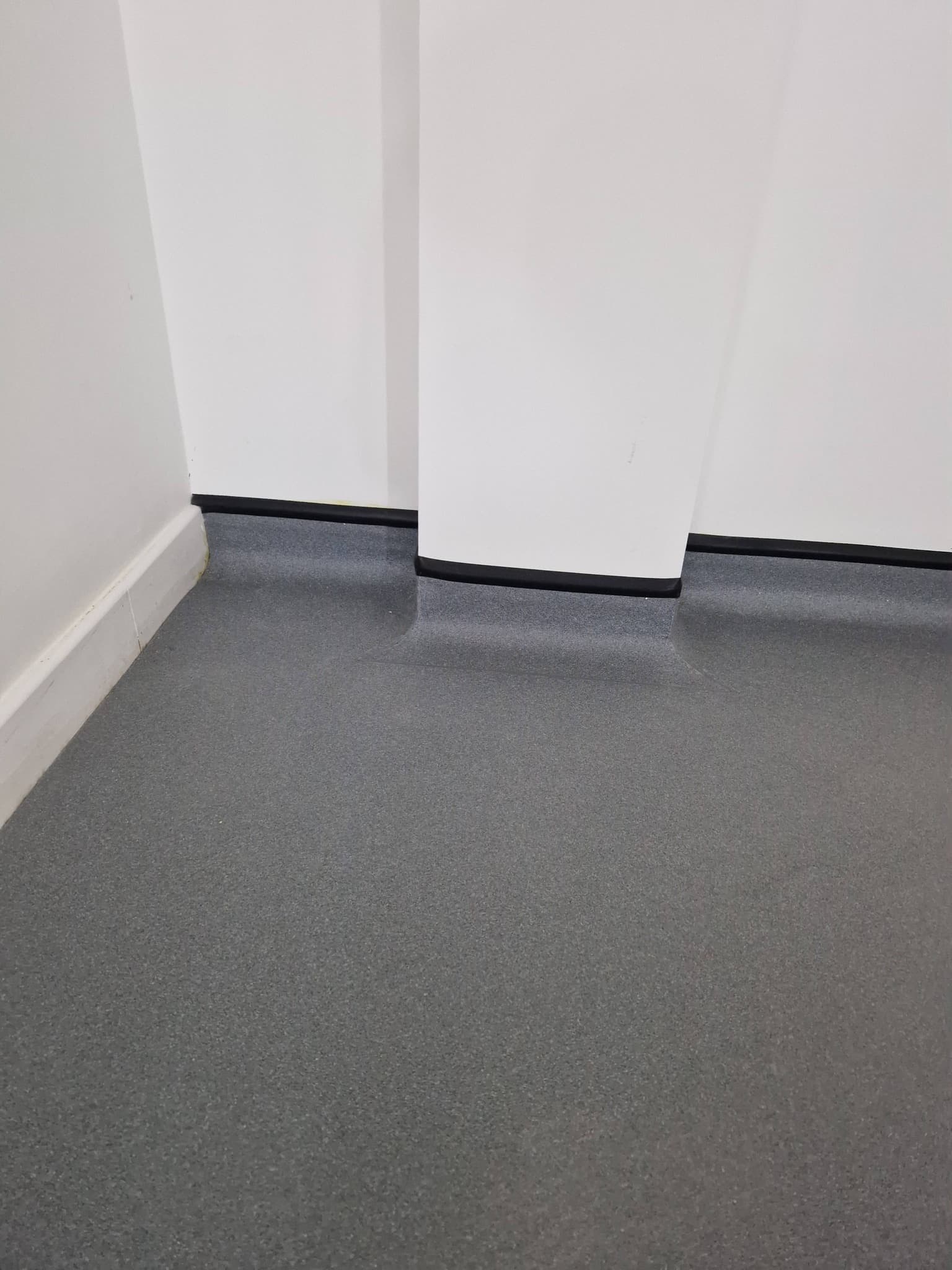 Corridor sheet vinyl install with sealed perimeter, Nottingham commercial site